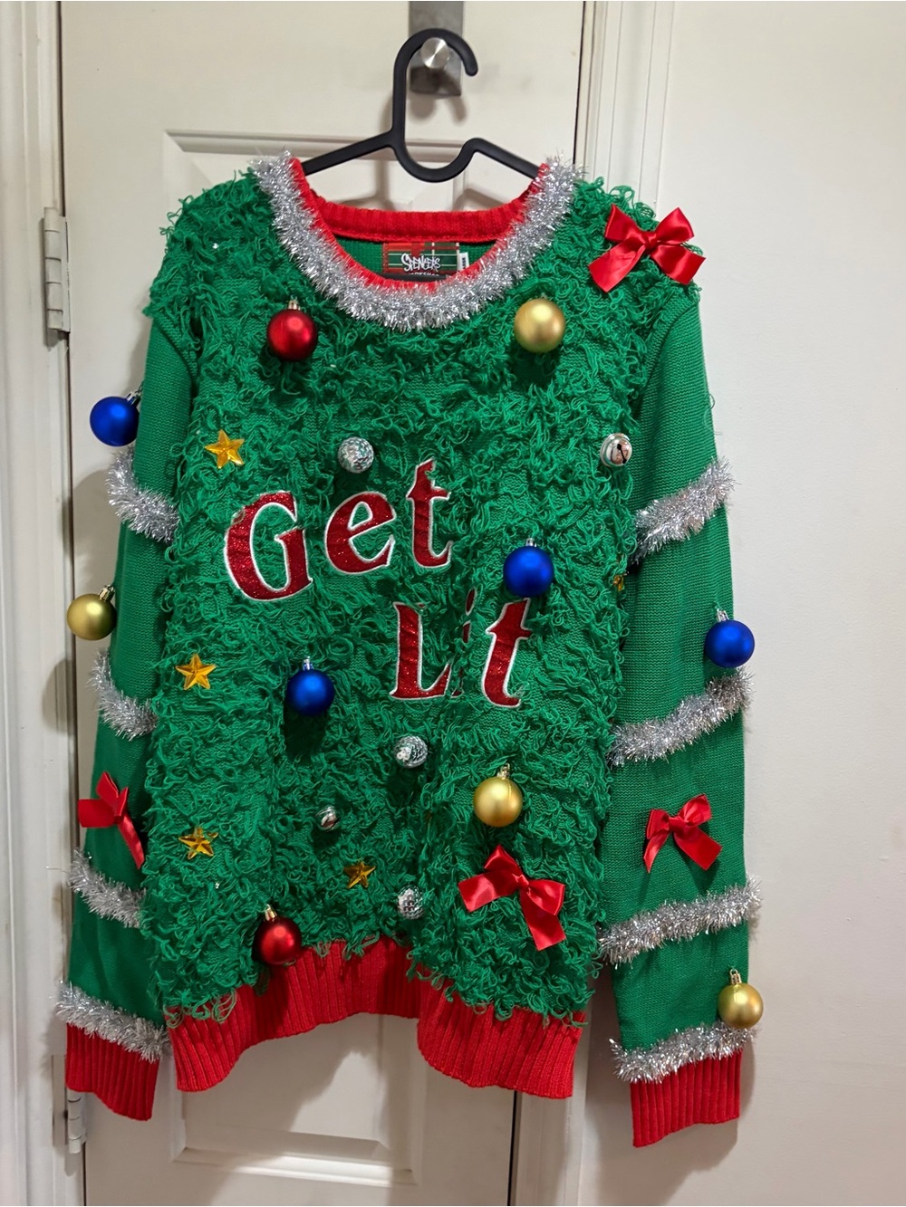 Spencer’s Green Holiday Get lit Sweater with Red Trim and Multicolor Ornaments
